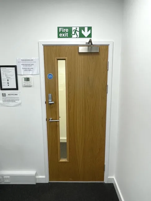 Timber-finish single door with a narrow glazed panel